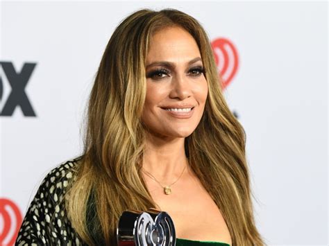 jennifer lopez shows off her killer curves in plunging gown photos
