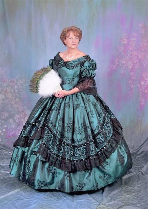 Romantic period silk ball gown, ca. 1860's Ball Gown made from Teal Taffeta Fabric,, trimmed ...