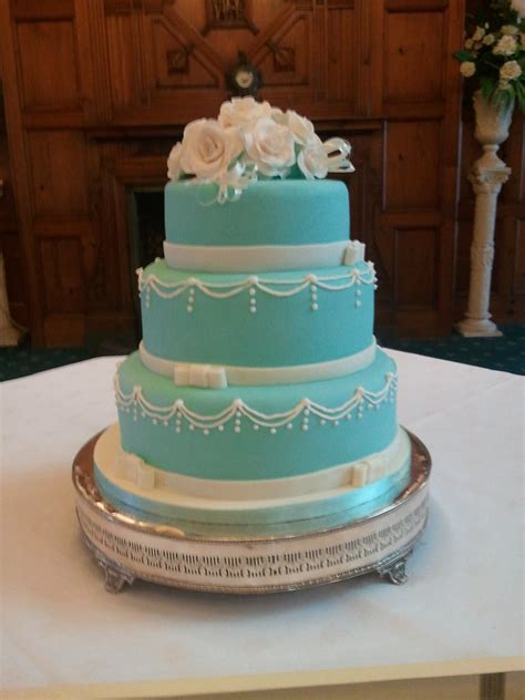Maybe you would like to learn more about one of these? 3 Tier Tiffany Blue wedding cake with hand made sugar rose ...