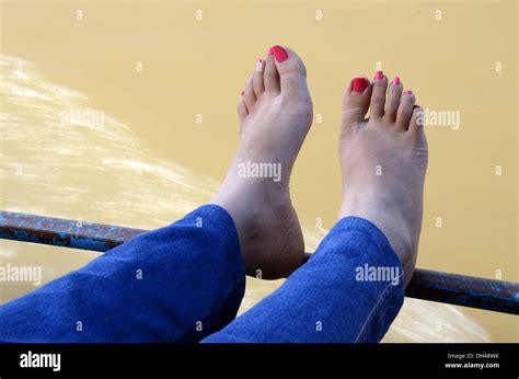 Woman Blue Jeans Drying Her Feet Red Nail Polish River Godavari