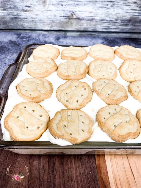 Southern style banana pudding with buttery chessman cookies. Paula Deen Banana Pudding Recipe - Ever After in the Woods