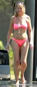 Carol Mcfin Shows Off Her Impressive Bikini Body As She Holidays