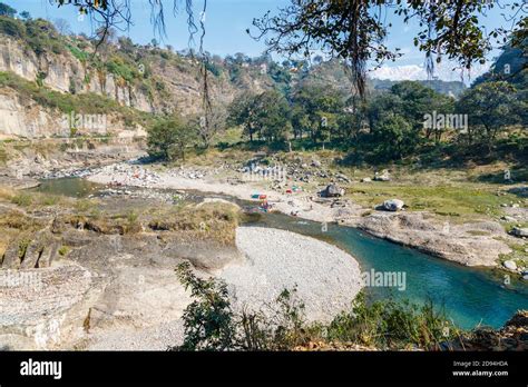 Gorge With Local People Washing And Drying Clothes On The Side Of A