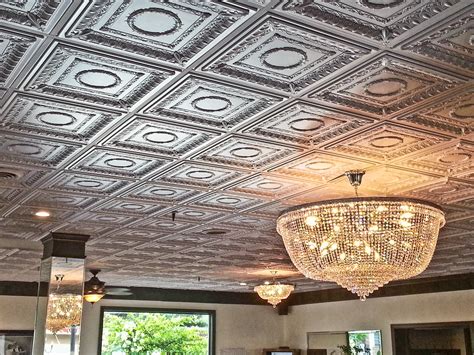 Compare pricing to replace vs. Antiqued Faux Metal Ceiling Tiles - InterSource Specialties