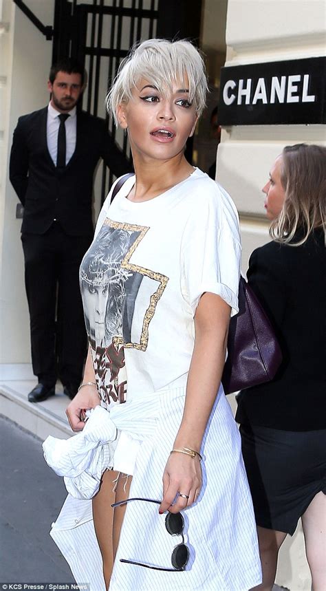 Rita Ora Flashes Sideboob As She Goes Braless In A Plunging White Shirt