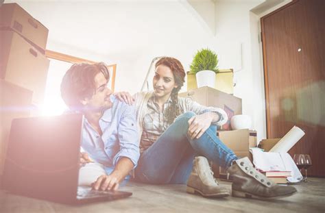 Young Couple Moving In Into New Apartment Stock Image Image Of Couple