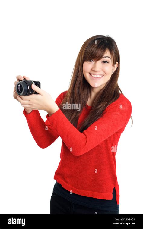 Mixed Asian Girl Taking Photo With A Compact Camera Looking At The