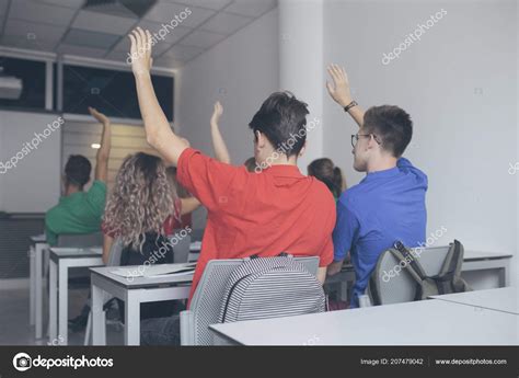 Group Schoolboys Schoolgirls Rising Hands Answer Question Stock Photo