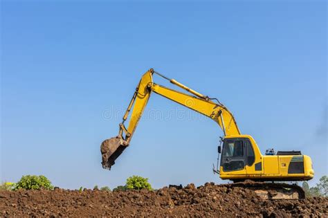 Yellow Excavator Digging Digger Machine Adjusting Ground Level In