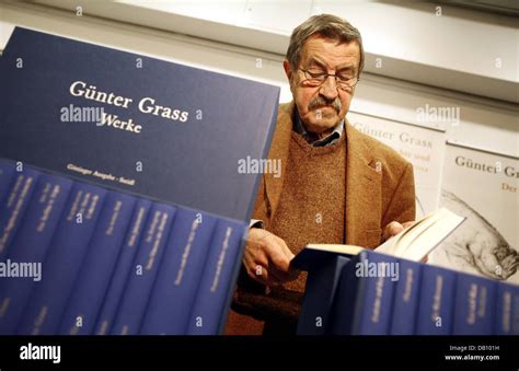 Nobel Prize Winning German Author Guenter Grass Poses With The Complete