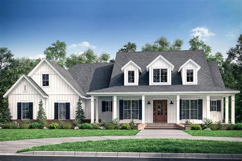 If you're after a 4 bedroom house plan that exudes style and functionality, then you've come to the right place! Fresh 4-Bedroom Farmhouse Plan with Bonus Room Above 3-Car ...