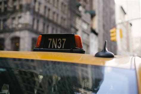 Taxi Label In City Street · Free Stock Photo