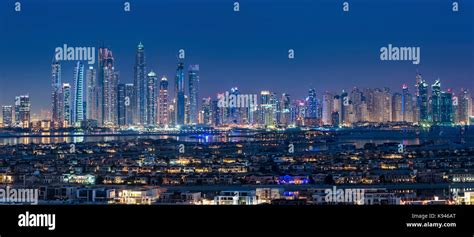 Cityscape Of Dubai United Arab Emirates At Dusk With Illuminated