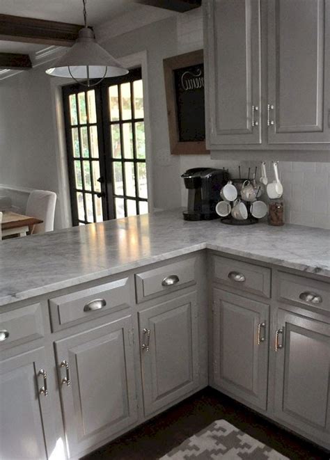 My kitchen has similar floors and countertops so this makes me happy that dark cabinets will work. 38+ Beautiful Farmhouse Gray Kitchen Cabinet Ideas - Page ...