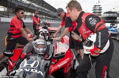 8 races in car #11. Matt Damon gets a high-five from wife Luciana Barroso ...