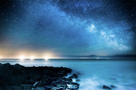 Milky Way Galaxy Over Fishing Boats Photograph By Property Of Chad