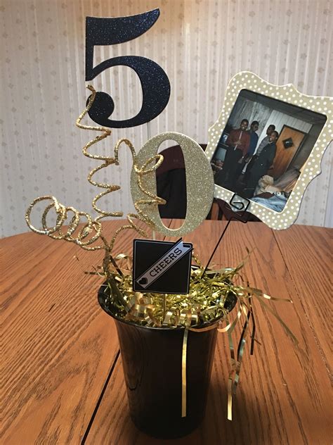 60th Birthday Party Centerpiece In Black And Gold Bir