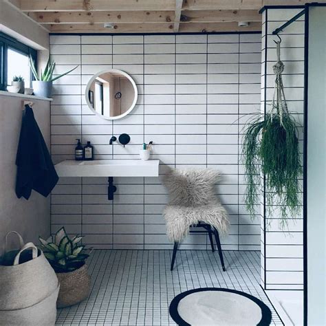 For a modern style go for tileworks tiles on walls and floors. Kelly Made A Refreshing White Bathroom Using Brick and ...