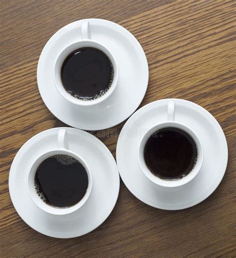 3 Cup Of Coffee On Wood Table Stock Image Image Of Coffee Detail 9814705