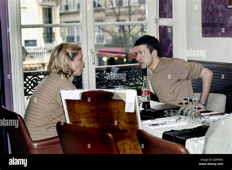 Paris France Young Adult Couple Sharing Meals Inside French Bistro