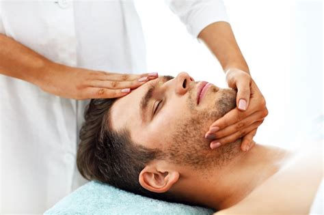 Premium Photo Handsome Man Having Massage In Spa Salon