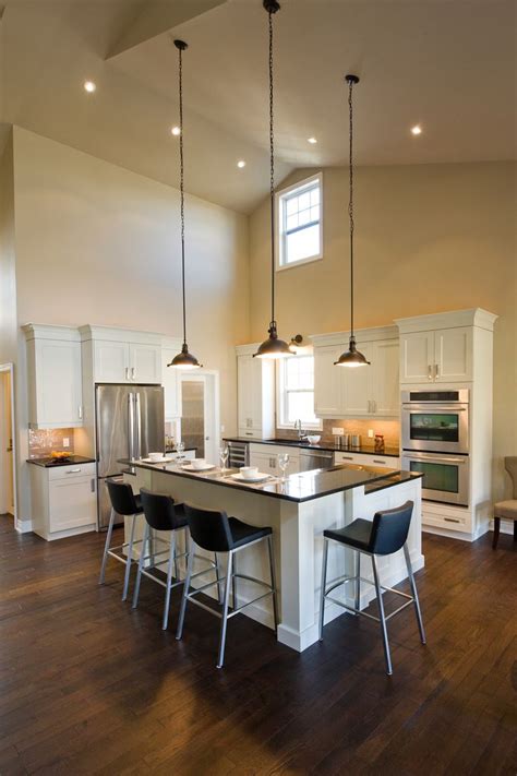 A pendant light, sometimes called a drop or suspender, is a lone light fixture that hangs from the ceiling usually suspended by a cord, chain, or metal rod. Old Mill Lane kitchen - L-shaped breakfast bar, high ...