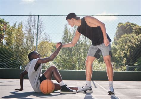 Sports Teamwork And Men With Helping Hand In Basketball Player Giving