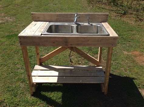 Maybe you would like to learn more about one of these? Vegetable washing station/old sink and pallet wood ...