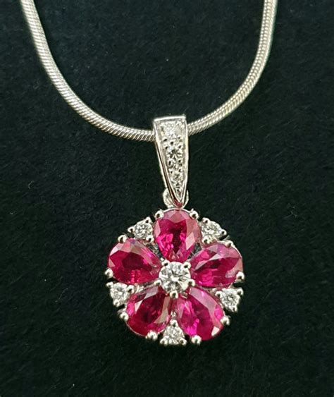 Modern Ruby And Diamond Floral Pendant Andrews Jewellers