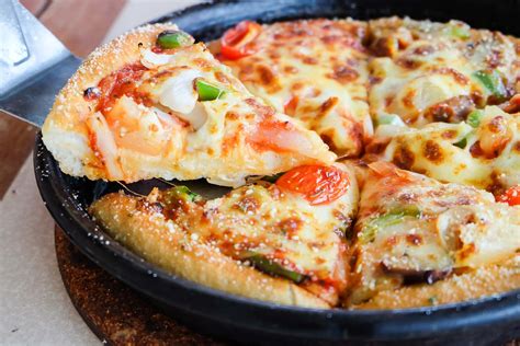 Homemade Pan Pizza With Perfectly Crispy Crust Recipe By Archanas Kitchen