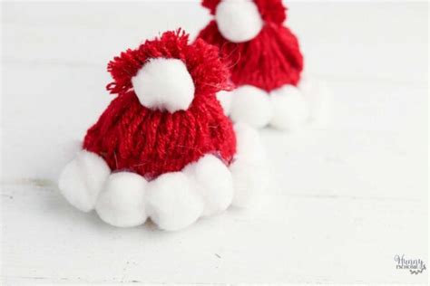 Easy Santa Hat Craft Made With Yarn And Pom Poms