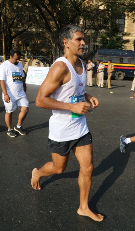 Milind Soman Running At The Standard Chartered Mumbai Marathon