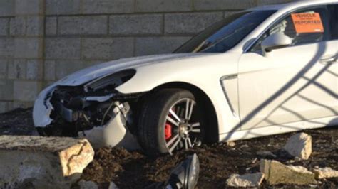 200000 Porsche Wrecked As It Crashes Through Wall Drops Three Metres