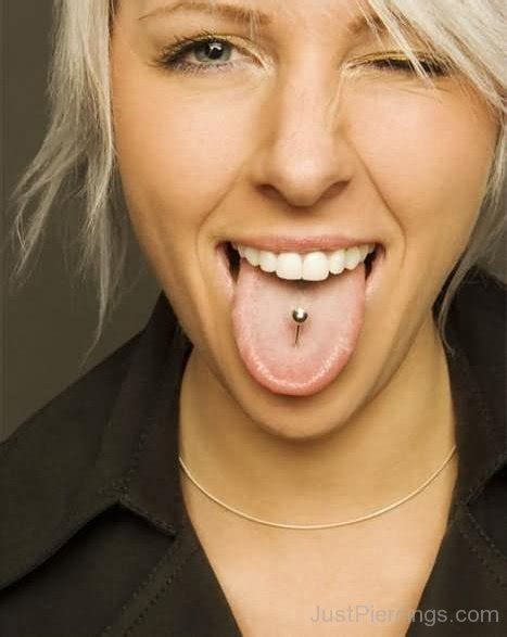 girl with tongue mouth piercing