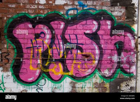Urban Graffiti With The Word Pish Spray Painted In Thick Bold Letters