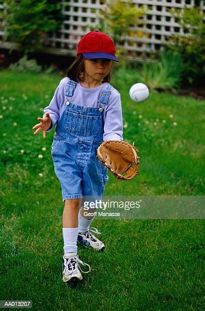 Girl Catching Baseball Photos And Premium High Res Pictures Getty Images