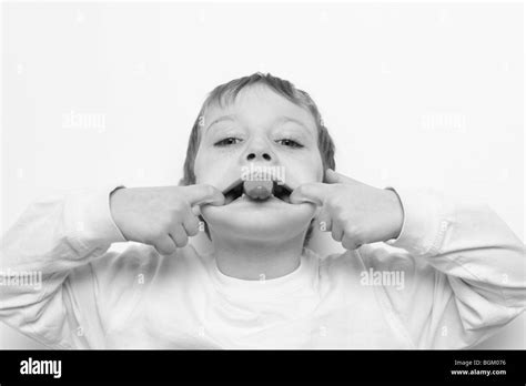 Boy Makes Funny Face Black And White Stock Photos And Images Alamy