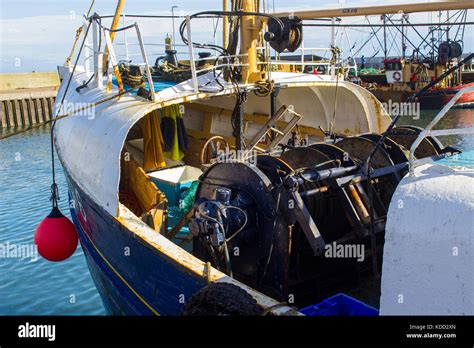 The Covered Bow And Heavy Duty Winches And Cables On The Deck Of A