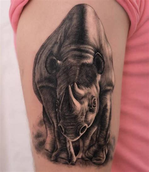 28 Creative Rhino Tattoo Designs And Ideas Tattoobloq Rhino Tattoo