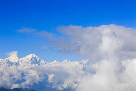 Rolling Clouds And Sunrise Snow Mountain Landscape Stock Image Image
