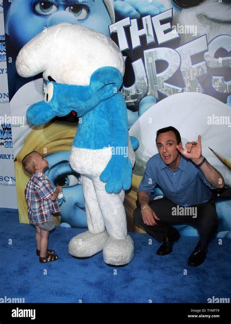 Hank Azaria And Son Arrive For The The Smurfs In 3d Premiere At The Ziegfeld Theater In New