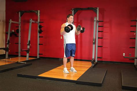 Standing Dumbbell Reverse Curl Exercise Videos And Guides
