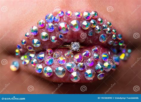 Woman Lips With Diamond Ring Sensual Womens Open Mouths Rich And Sexy