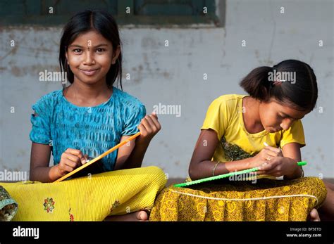 Indian School Girls Sitting Outside Their School Writing On Chalkboards Andhra Pradesh India