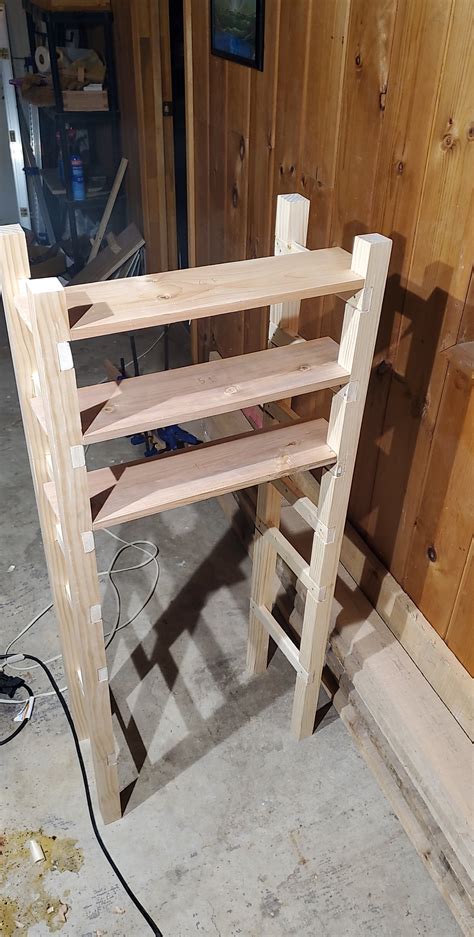 Shoe rack with cheap materials and beginner joinery. Pine 2x2, furring