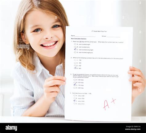 Girl With Test And Grade At School Stock Photo Alamy