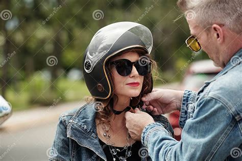 Boyfriend Helping Girlfriend To Wear Helmet Stock Image Image Of