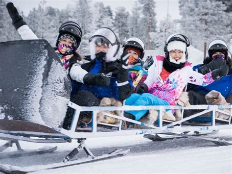 Santa´s Sleigh Ride Snowmobile Safari Taxari Travel Agency Lapland