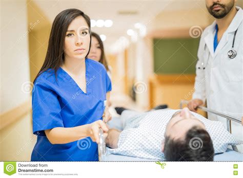 Nurse Helping Transport A Patient Stock Image Image Of Running Cute