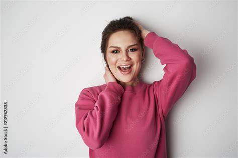 Beautiful Happy Women With Big Brown Eyes Wearing Pink Hoody And
